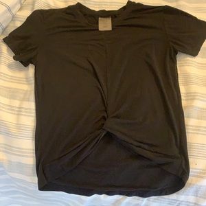 DYI XS Black tee with twisted bottom in front. Good condition.